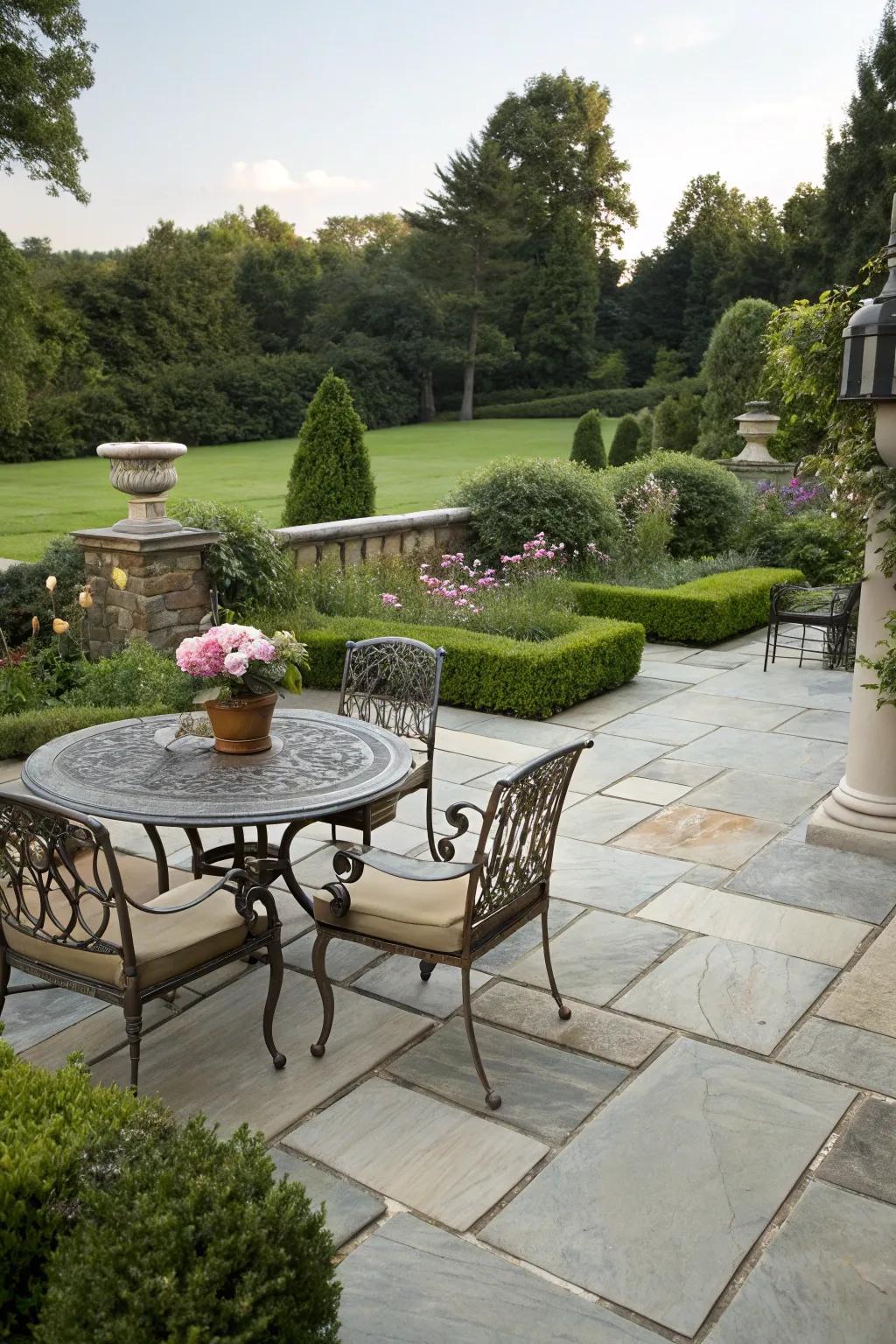 An elegant outdoor living space set up on a flagstone patio.
