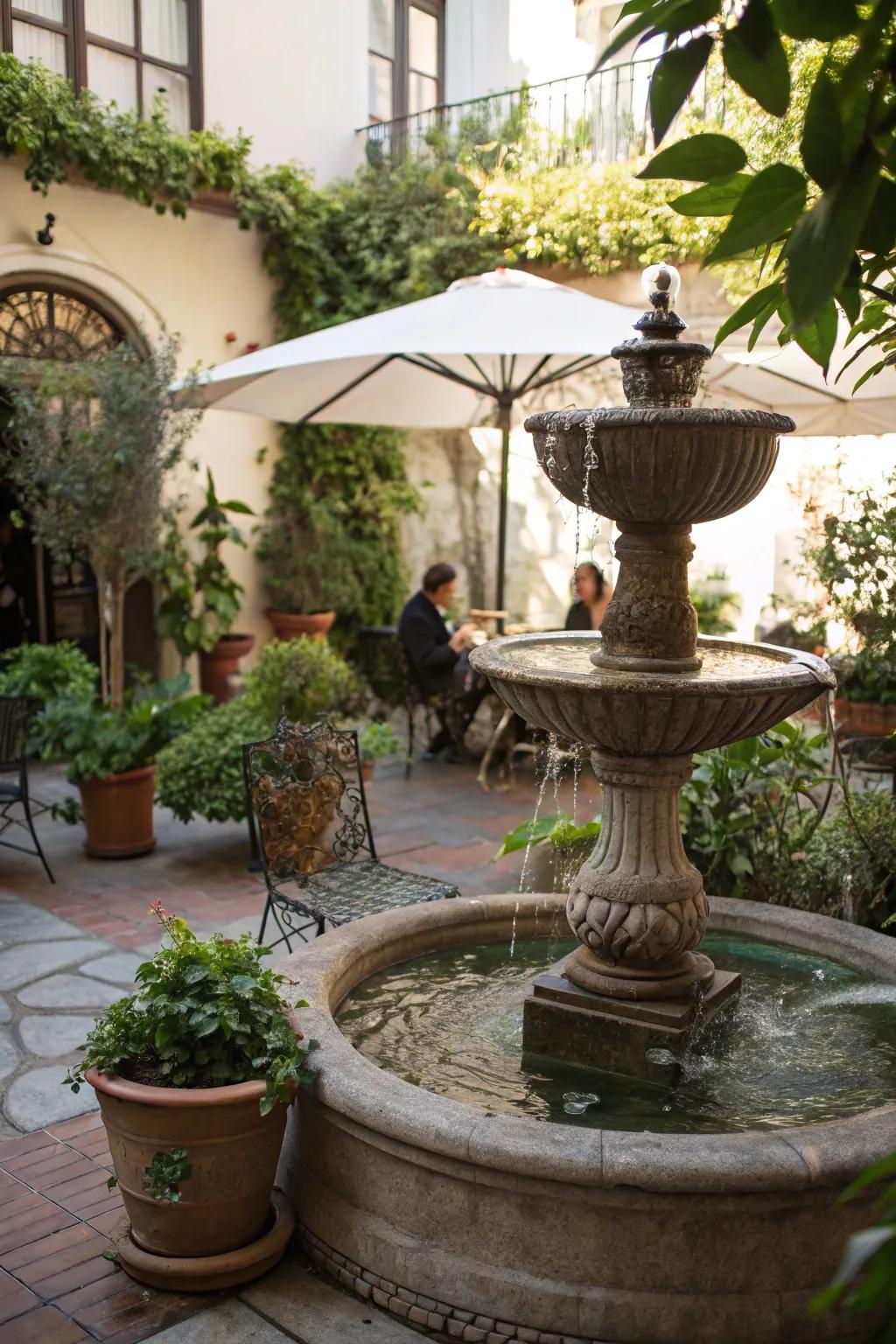 A petite fountain enhancing the allure of a snug patio.