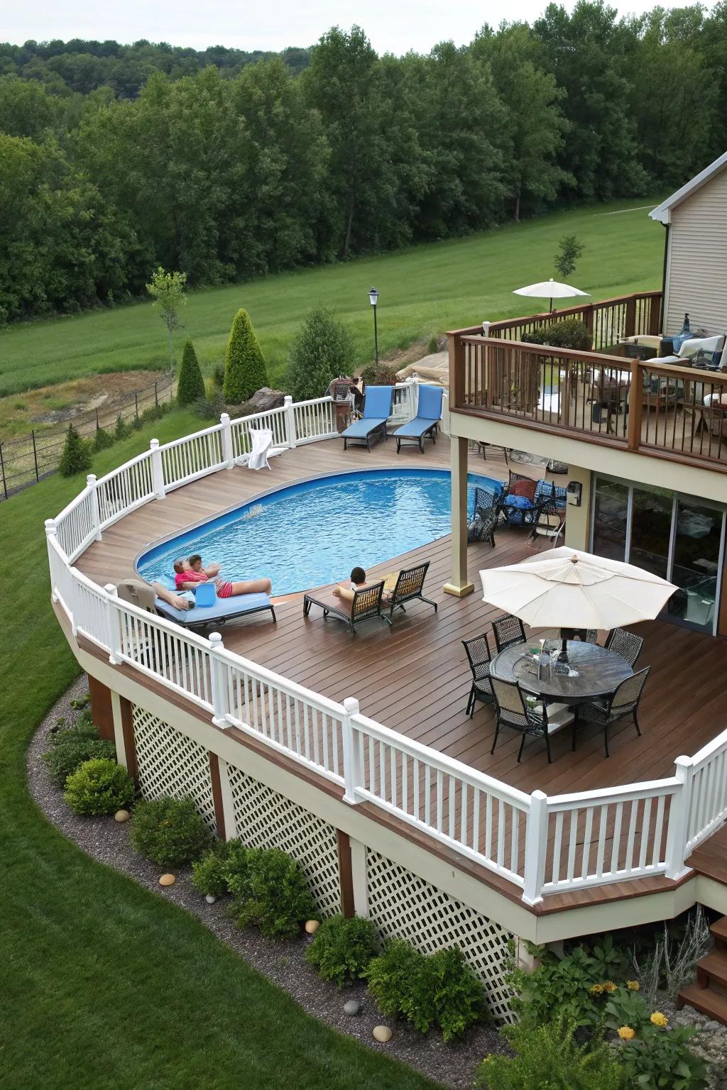 Tiered decking enriches this poolside space with added dimension and utility.