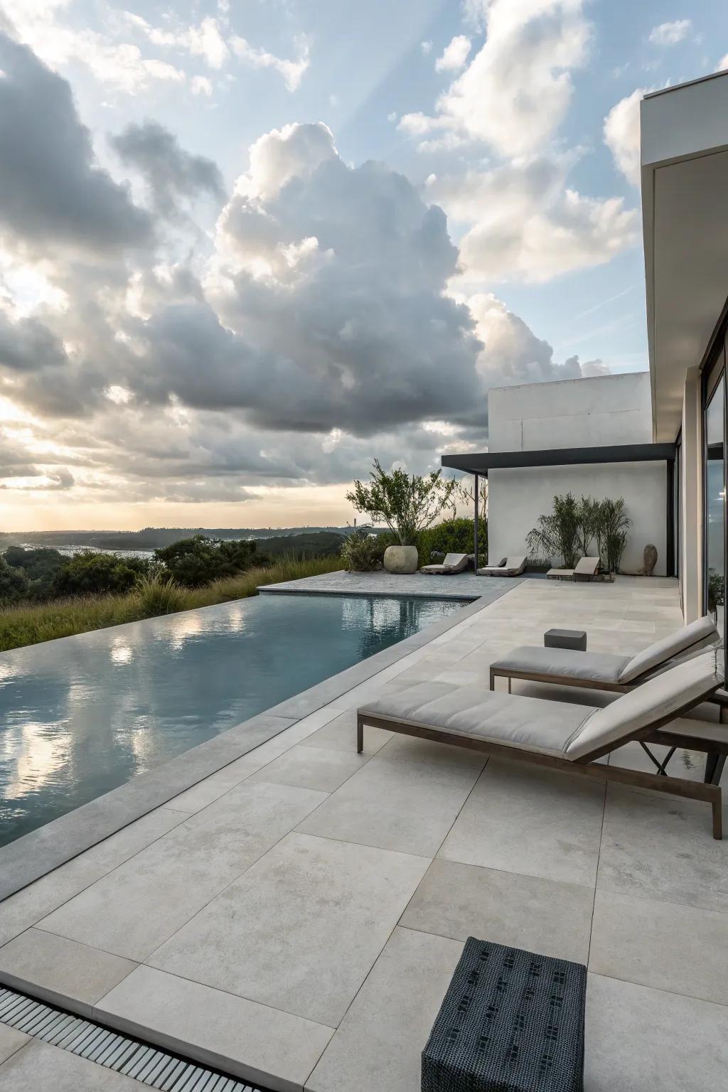 Concrete hardscaping delivers a modern touch to your poolside.