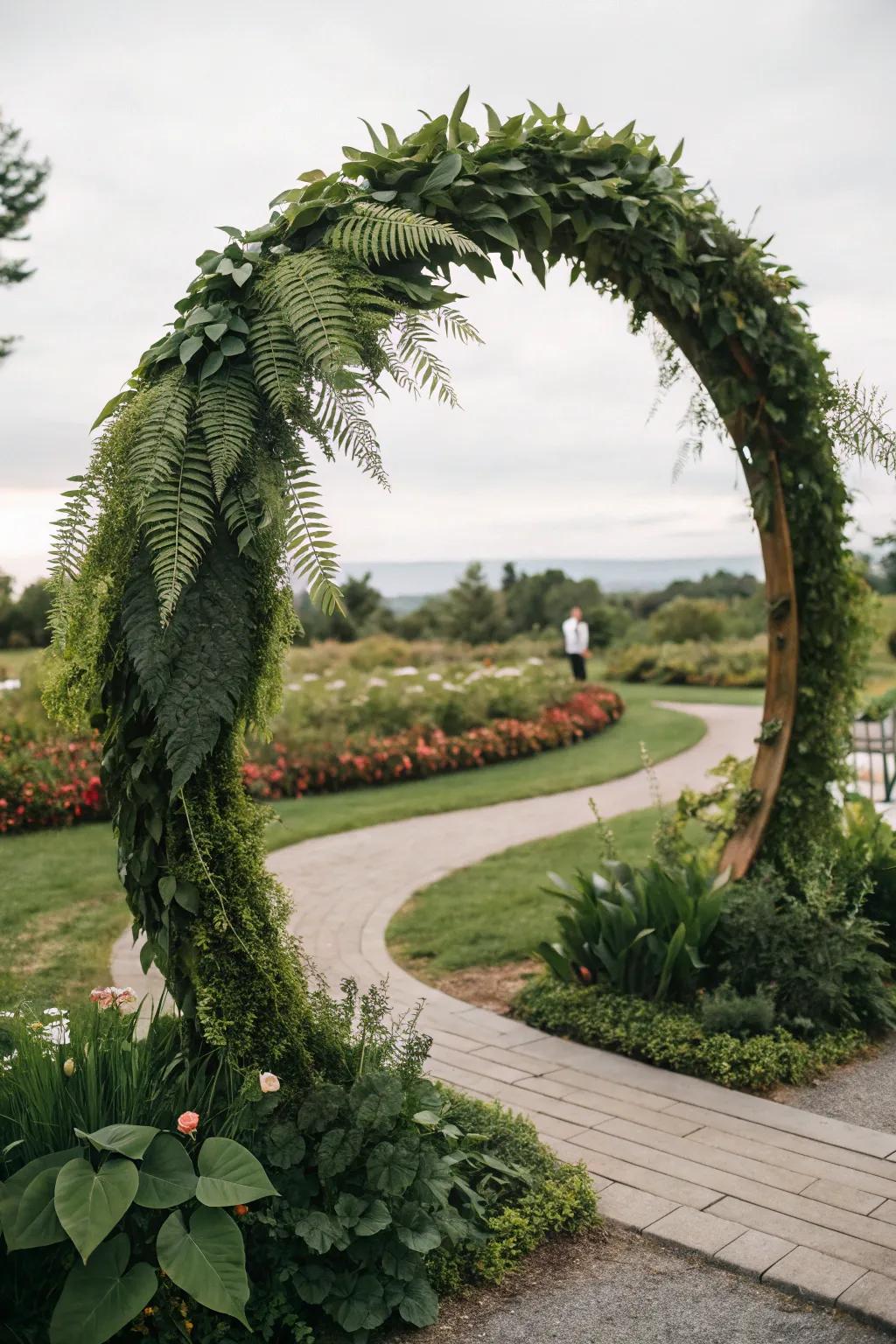 A leafy circular wedding arch creating an organic ambiance.