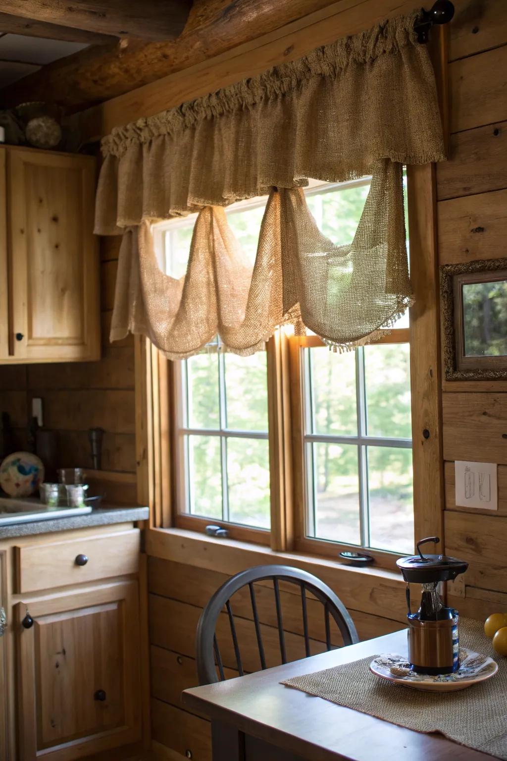 A warm kitchen featuring a hessian fabric valance that complements the country-style wooden components of the area.