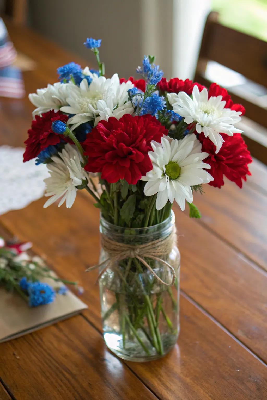 Patriotic blooms elegantly arranged in a modest preserving jar.