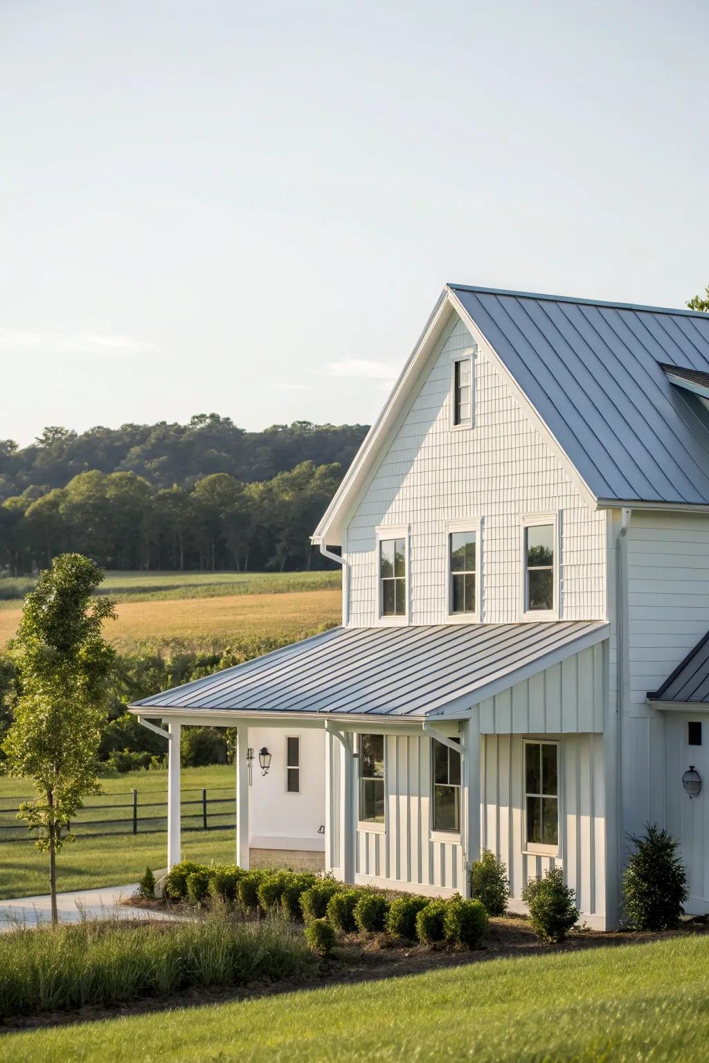 A contemporary country house featuring white vinyl siding and a stylish steel roof.