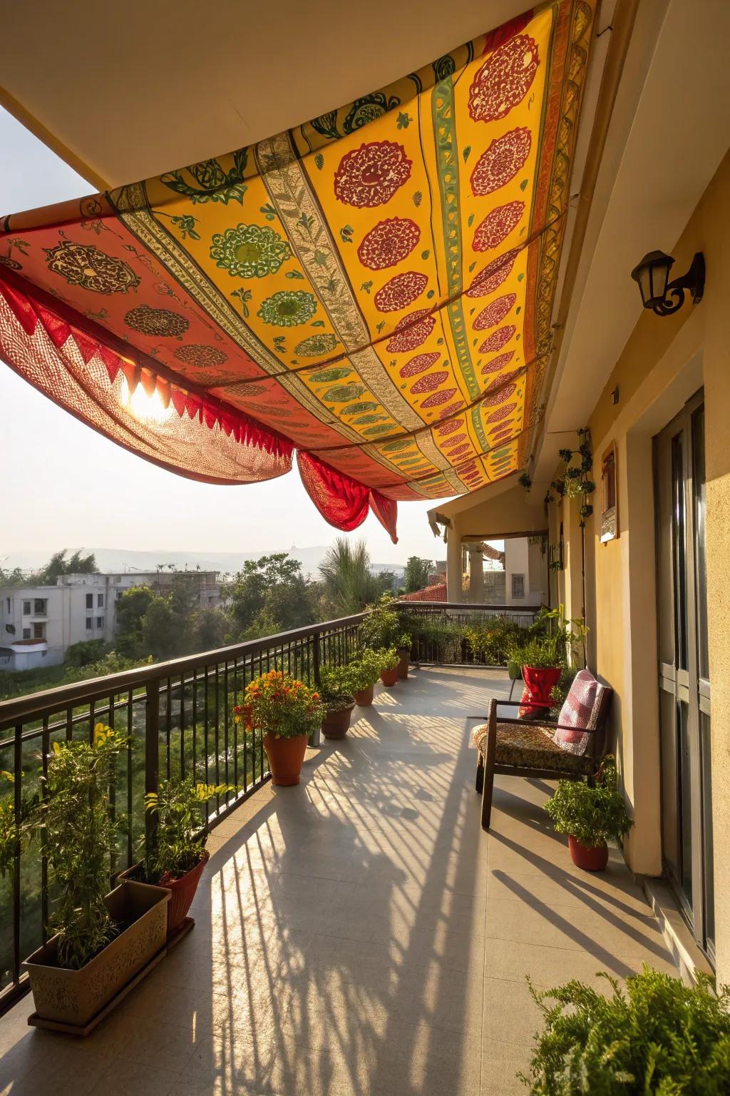A balcony brightened by a colorful fabric protector offering generous shade.