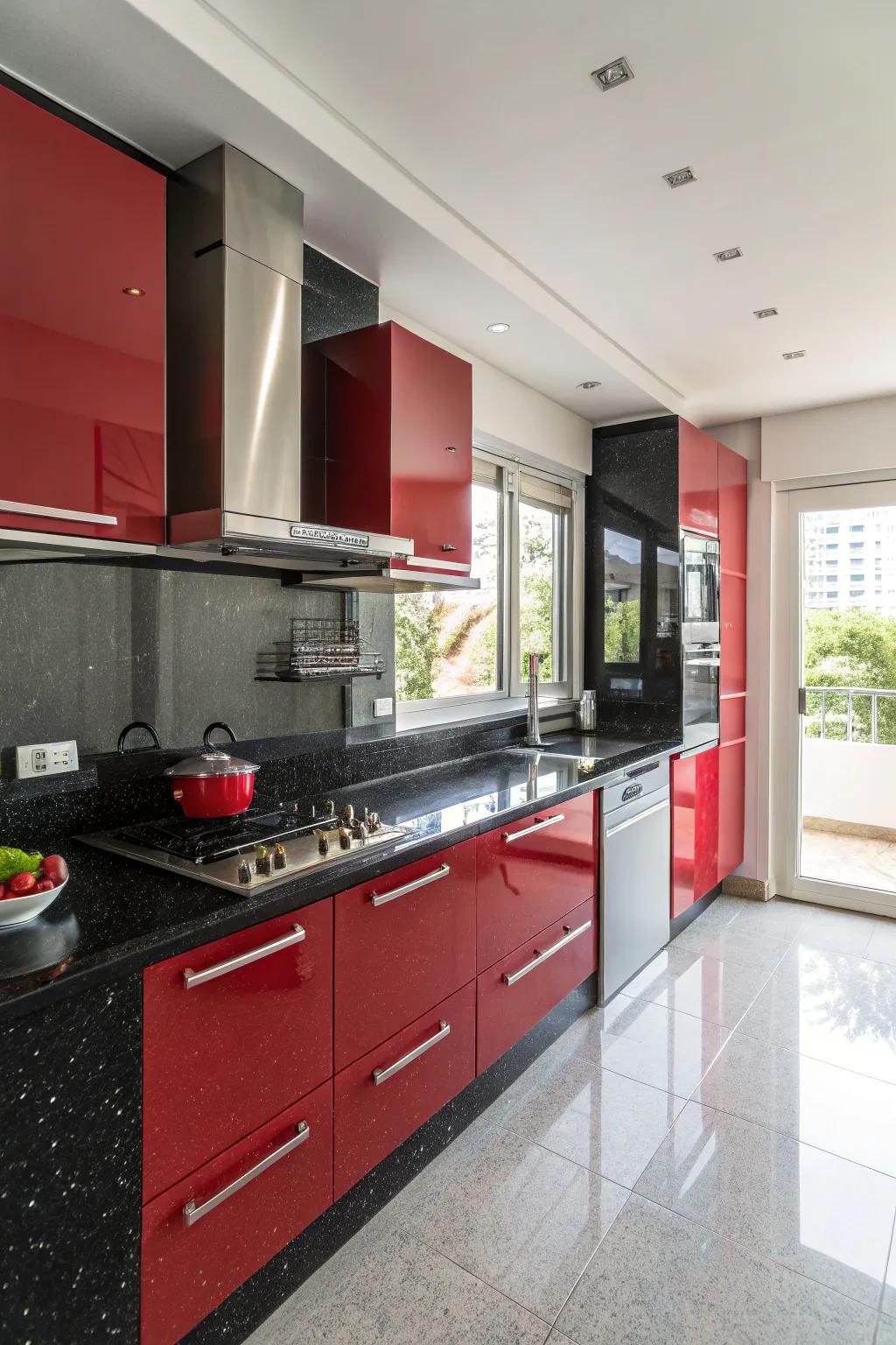 Ebony granite countertops furnish a streamlined contrast to scarlet cabinetry.