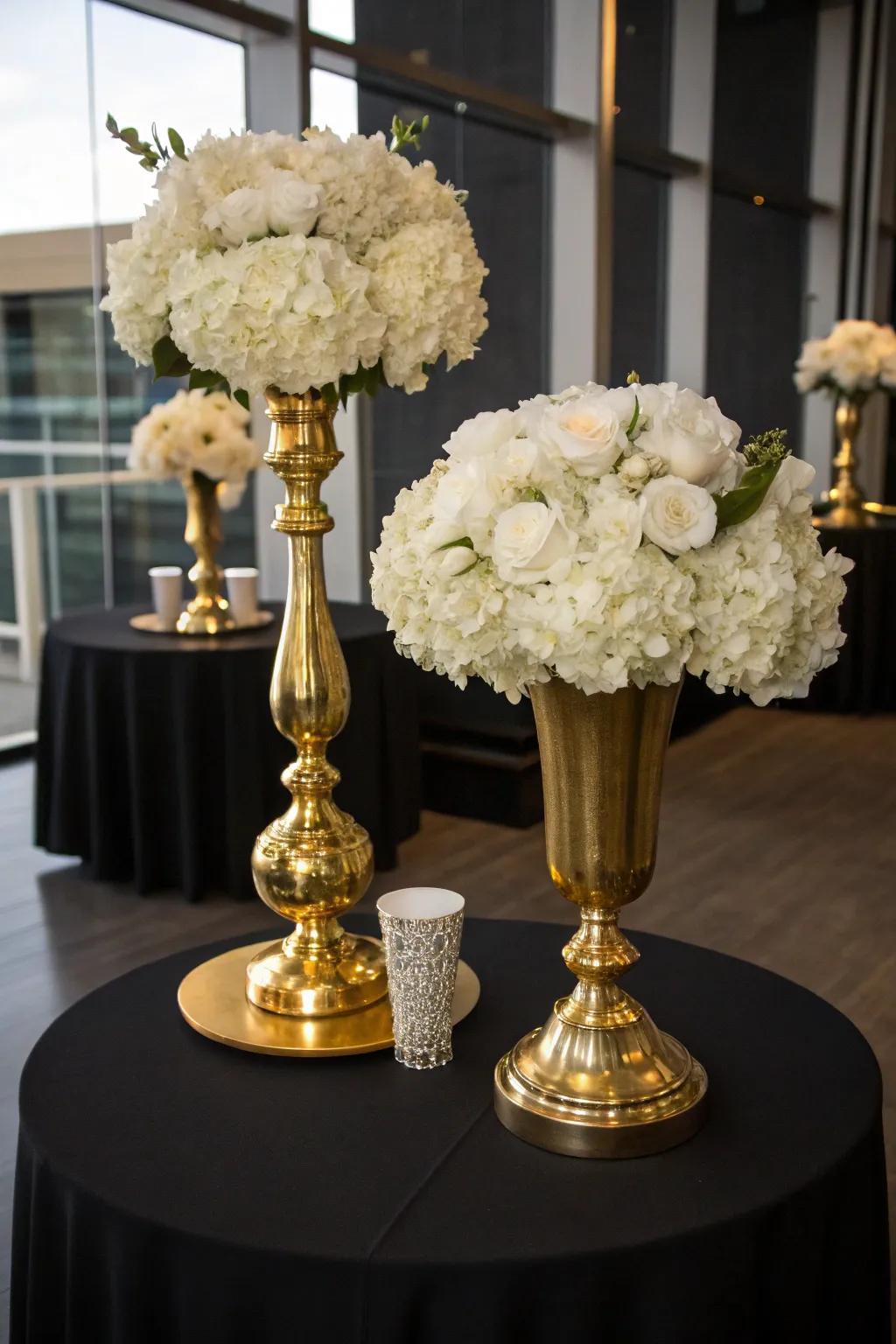 Gilded vessels with ivory blooms craft a refreshing and sophisticated setting.