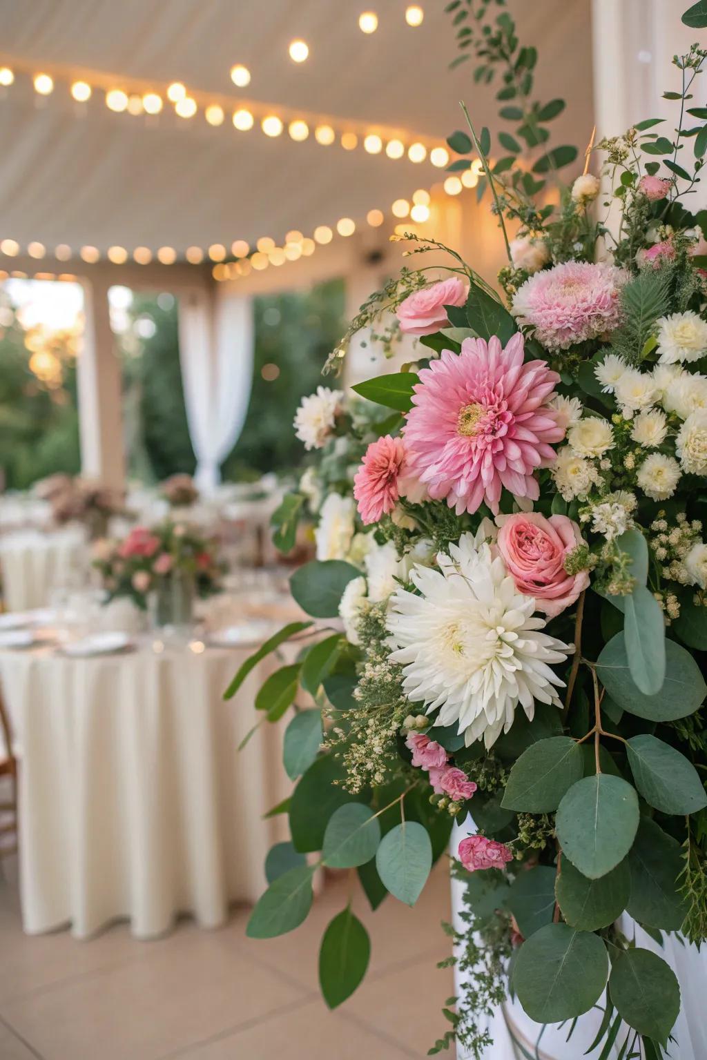 Pompons add richness and bulk to a wedding flower composition.