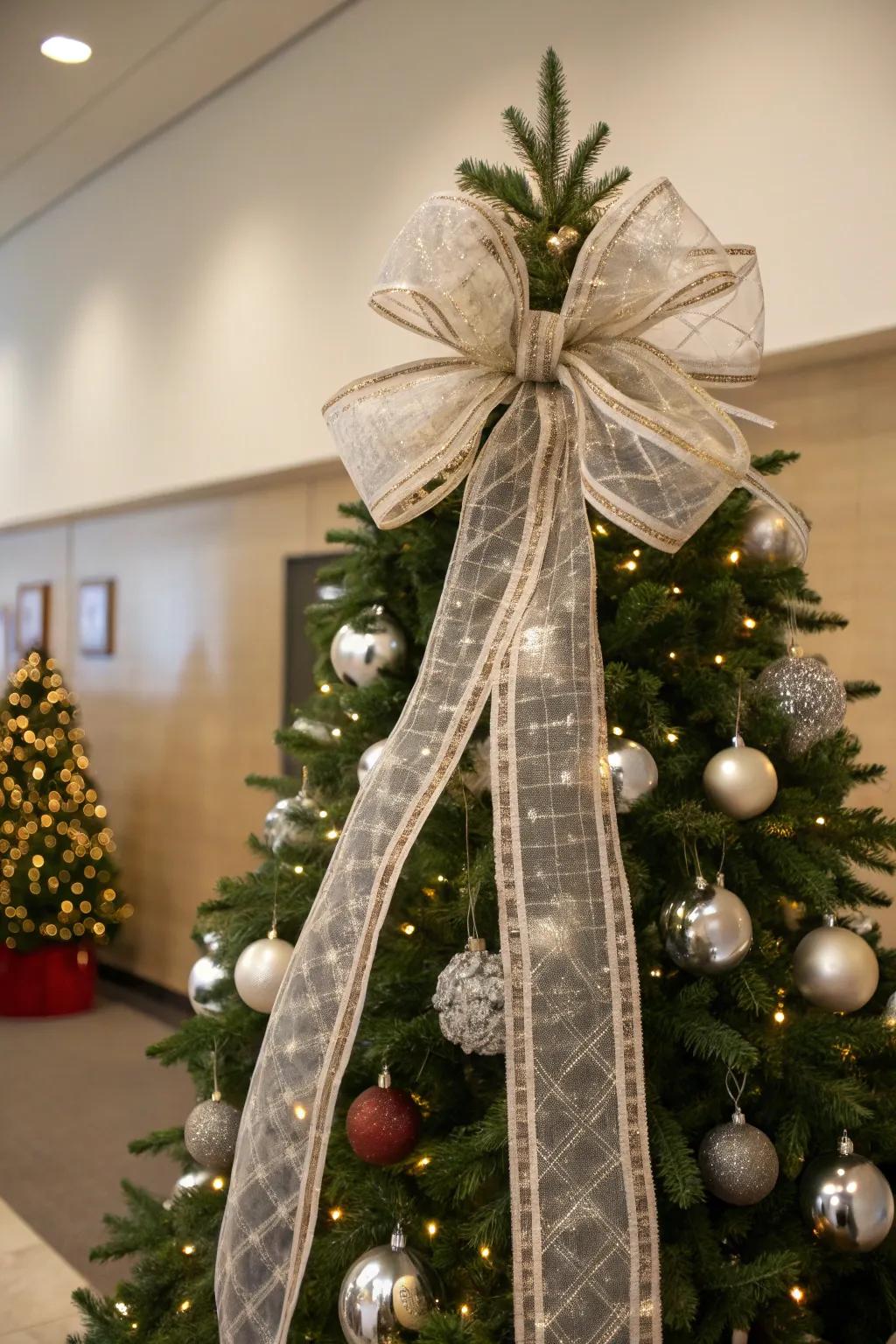 A Christmas tree crowned with a majestic loop, injecting a timeless attribute to the festive decorations.
