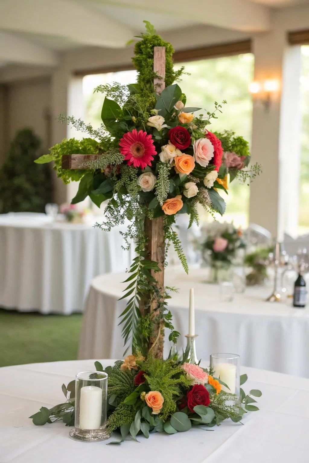 A botanical cross centerpiece introduces a refined and meaningful element to the table.