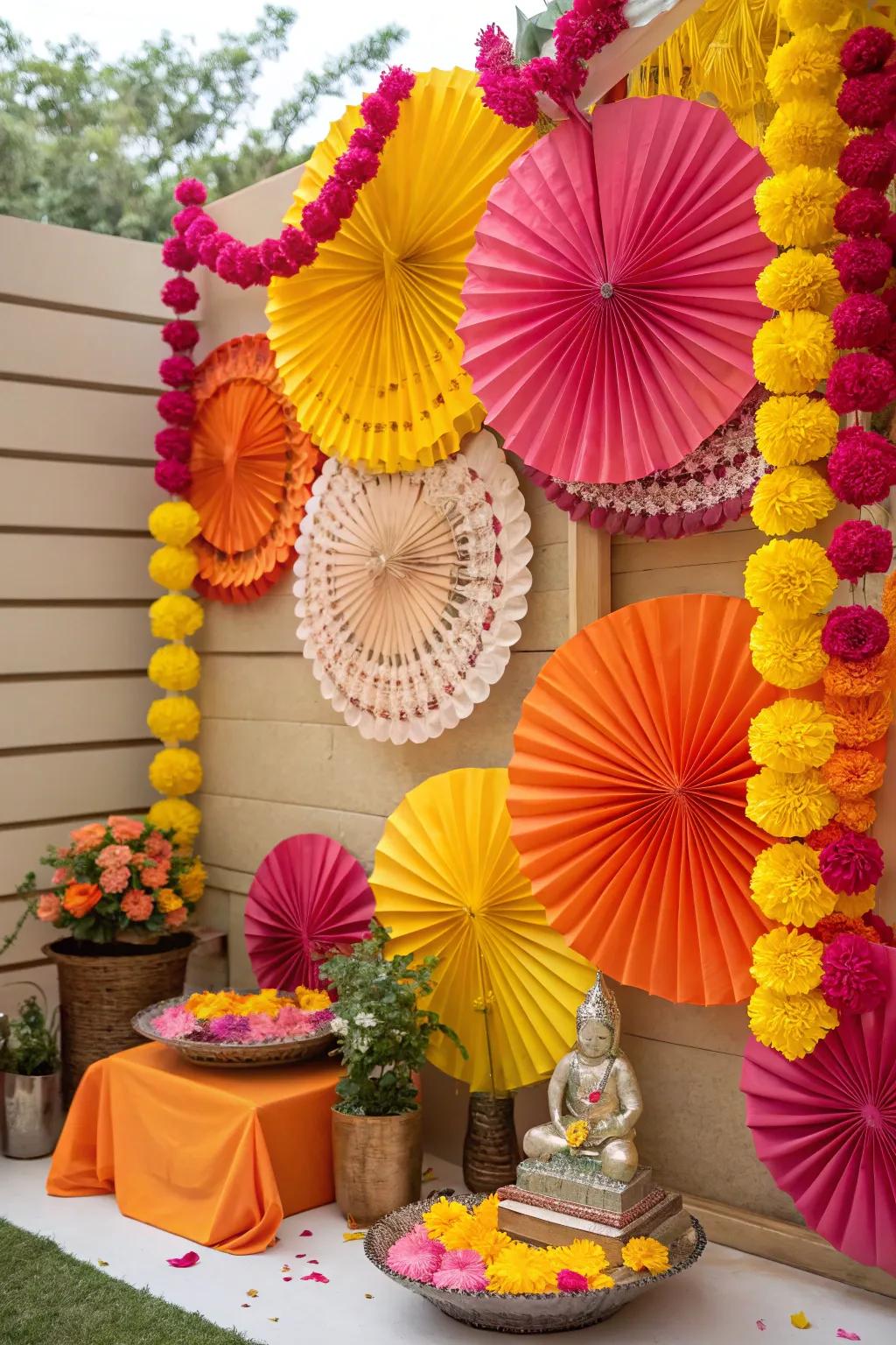 An energetic backdrop of paper blossoms and fans, infusing a playful nuance to the Ganesh Chaturthi festivities.