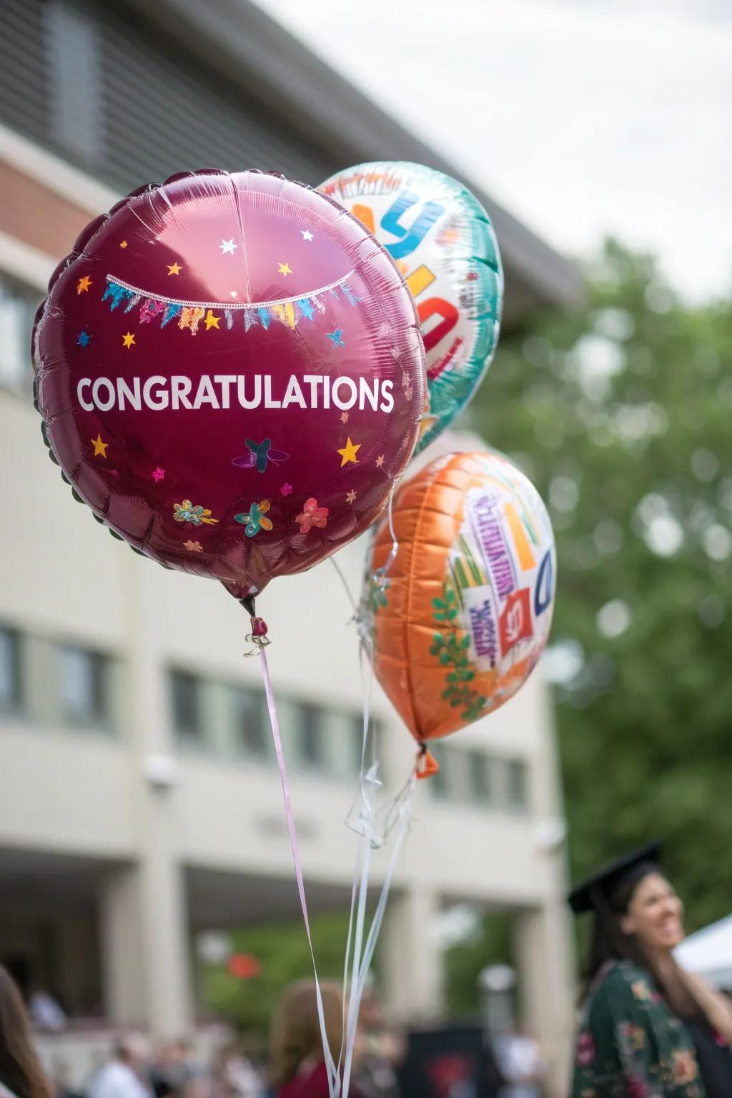 Personalized balloons featuring the graduate’s name and personalized messages.