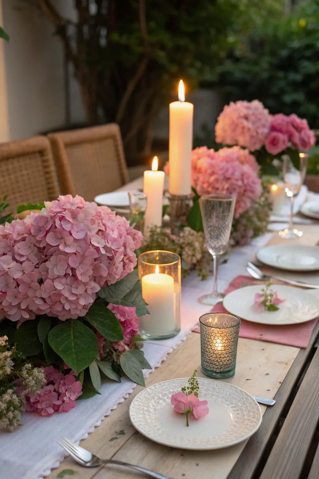 Pink starburst blooms and candles set the stage for a cozy dinner.