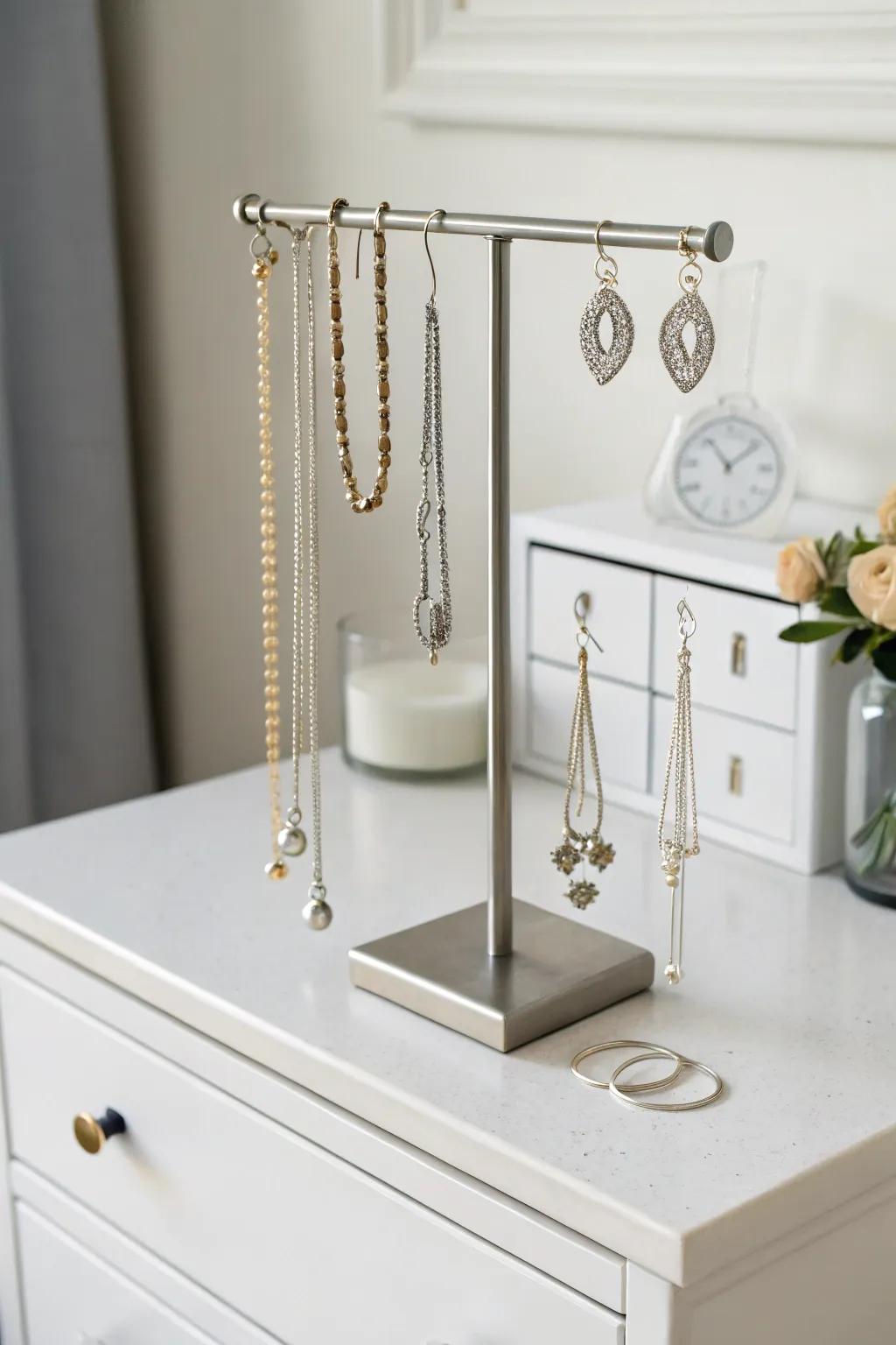 A sleek metallic stand for jewelry