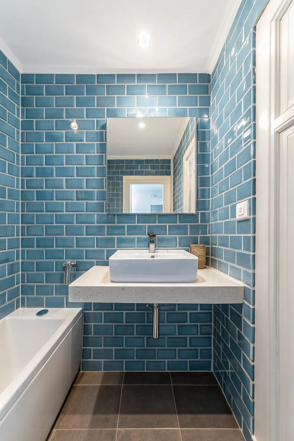 Blue metro tiles contribute a modern accent to this bathroom.