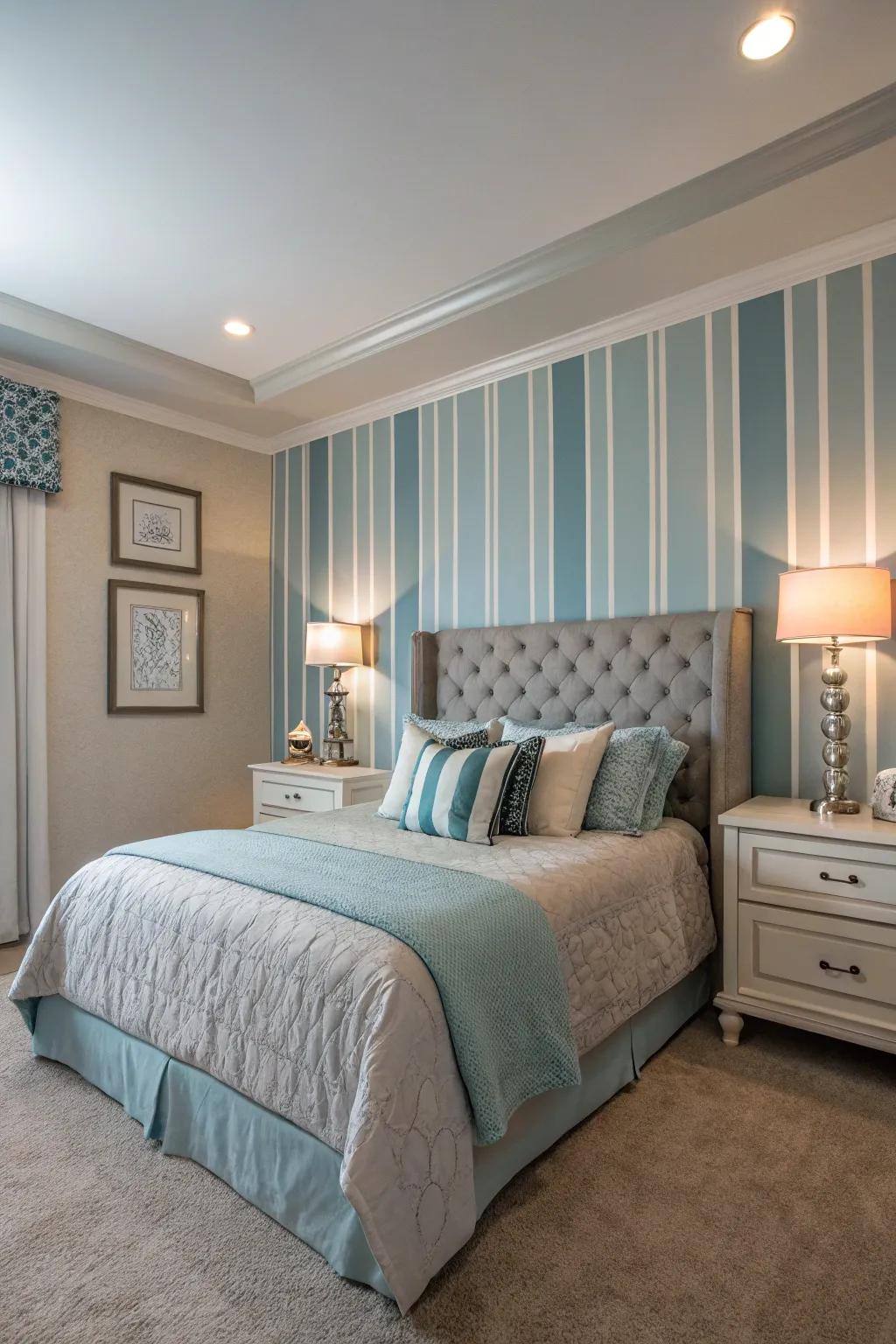 Striped walls lend elegance to this versatile bedroom.