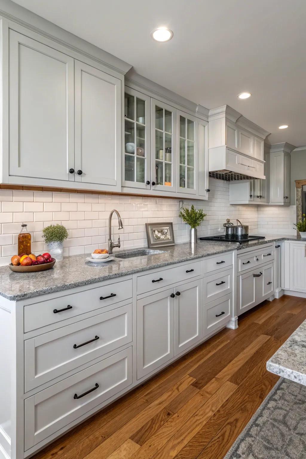 Grey countertops exquisitely complementing chalky cabinetry.