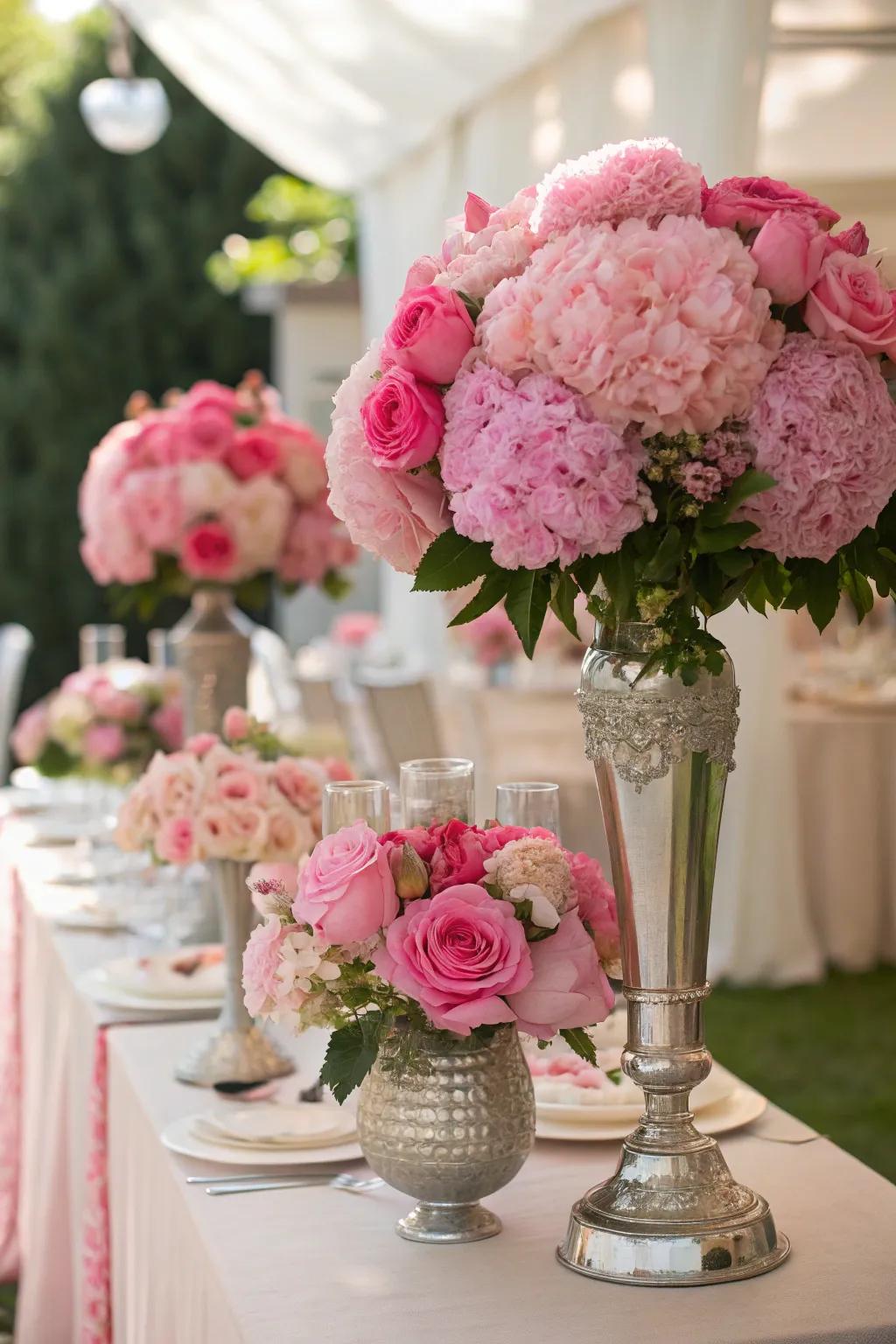 Rose-colored botanical arrangements infuse vitality and elegance into the party decor.
