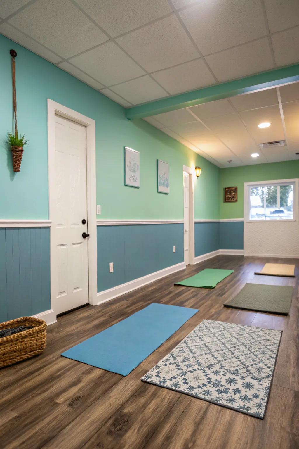 Small yoga room featuring soothing blue and green painted walls.