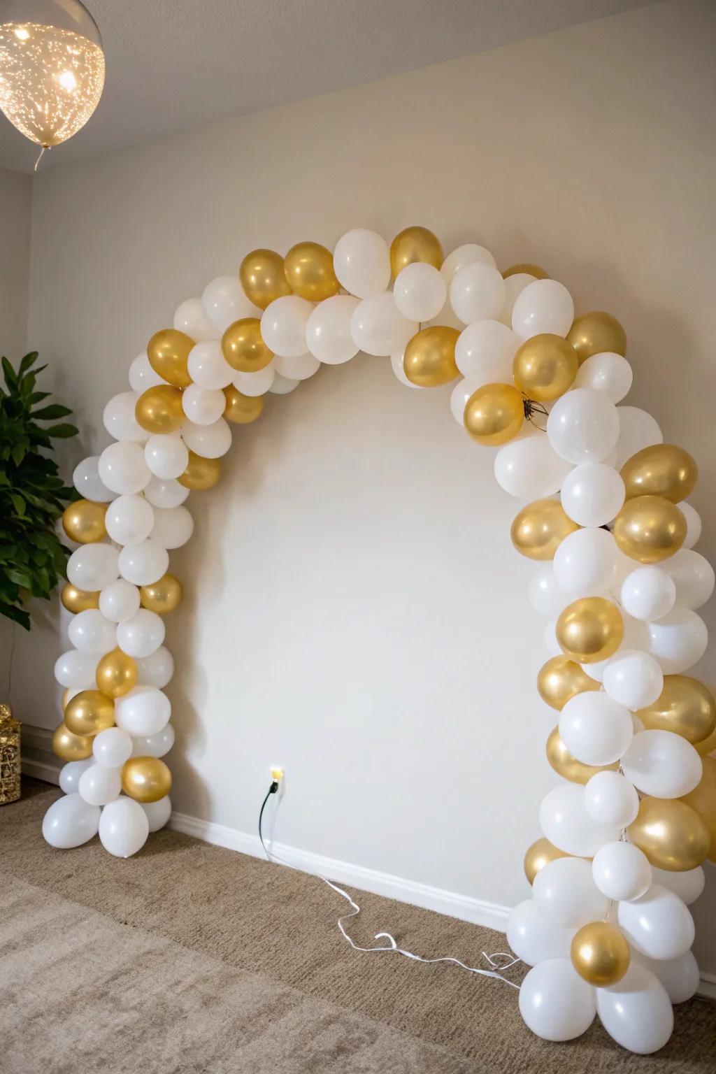 A fashionable, simple balloon arch in a monochrome palette.