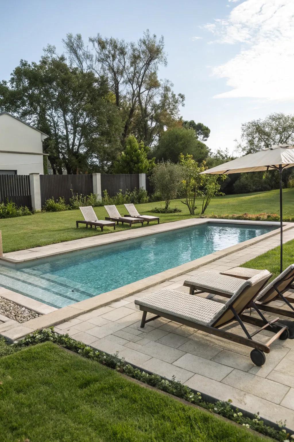A sparkling swimming pool, the heart of a relaxing backyard retreat.
