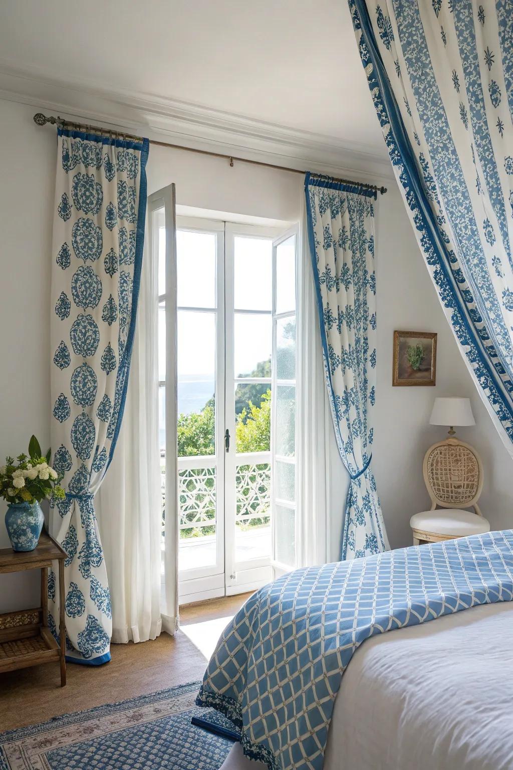 Patterned window treatments in blue and white add style and function to the bedroom.