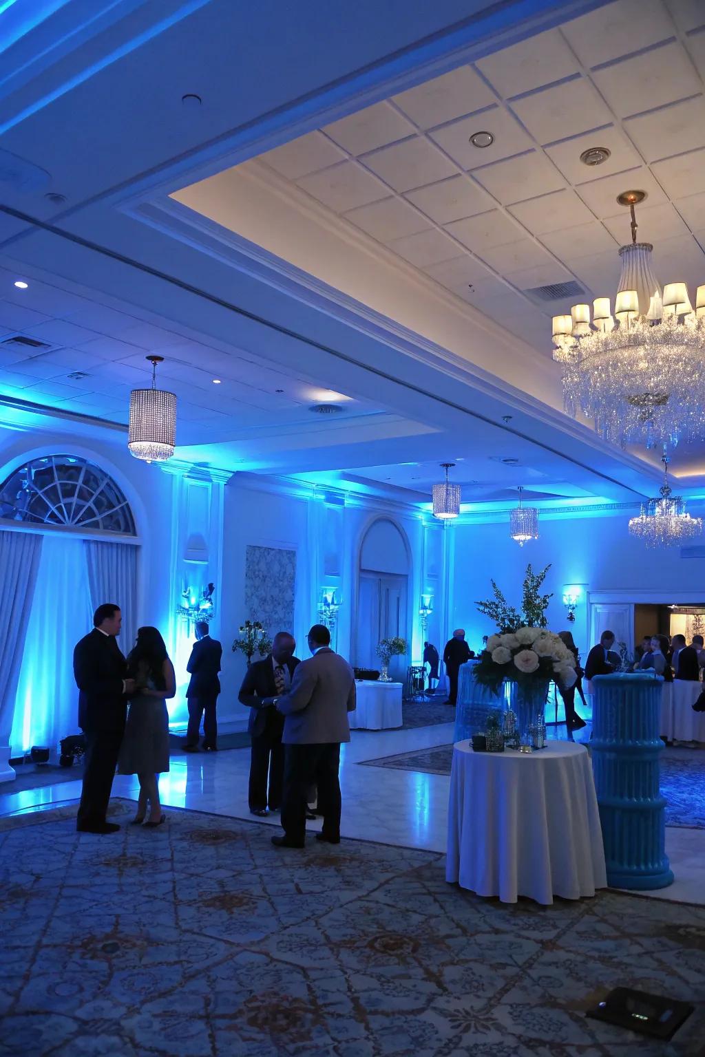 Blue lighting provides a serene, enchanting glow to the celebration.