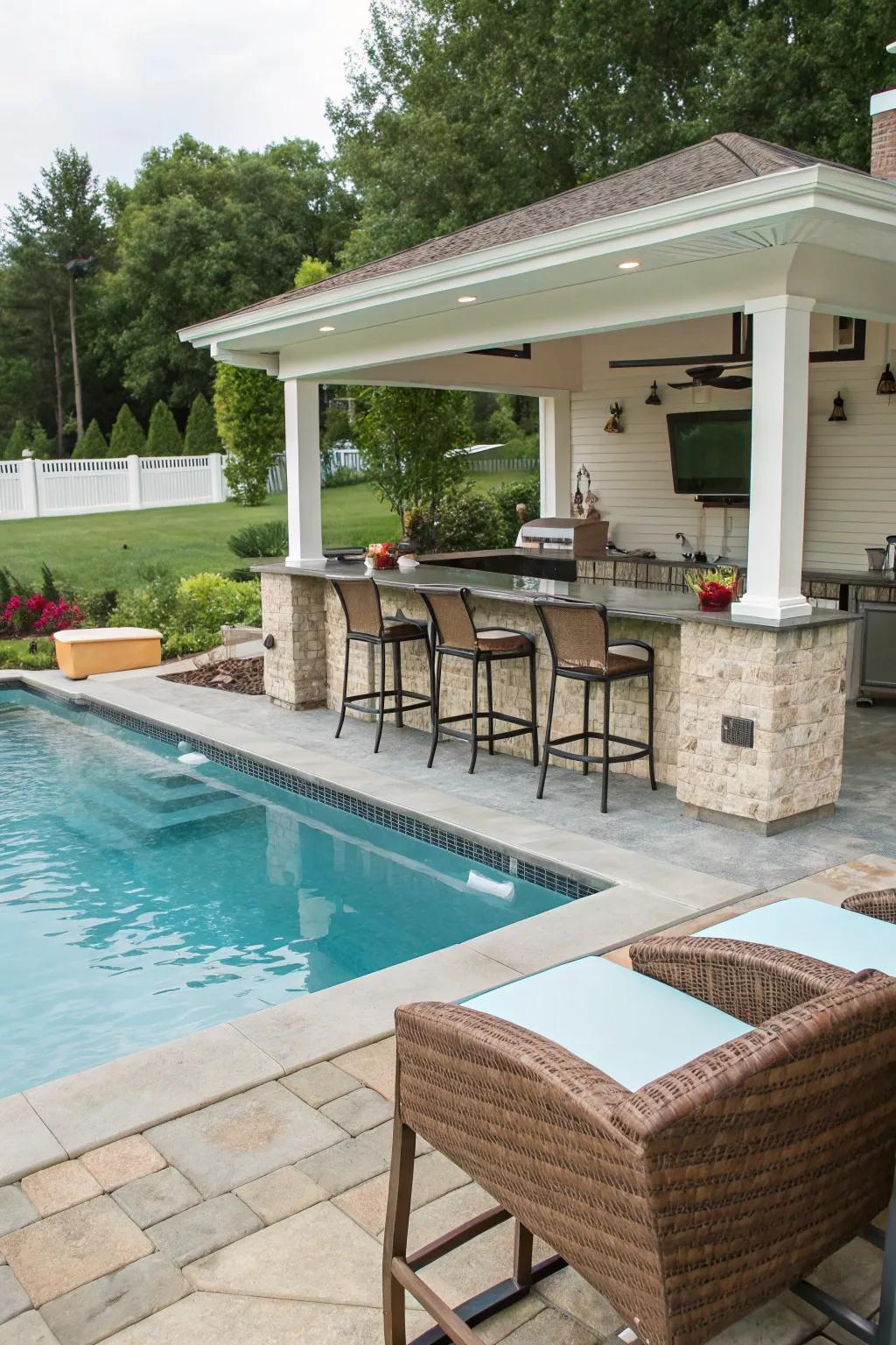 A stylish swim-up counter in a backyard pool.