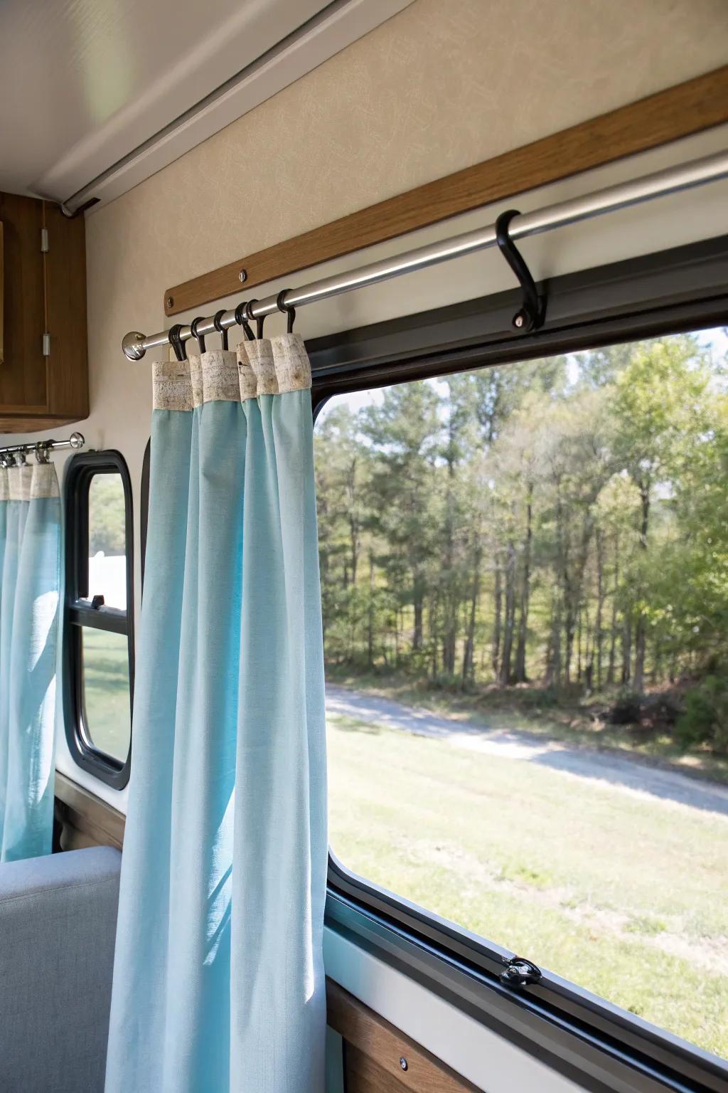 Simple and effective: adhesive mounts for curtain rods in an RV.