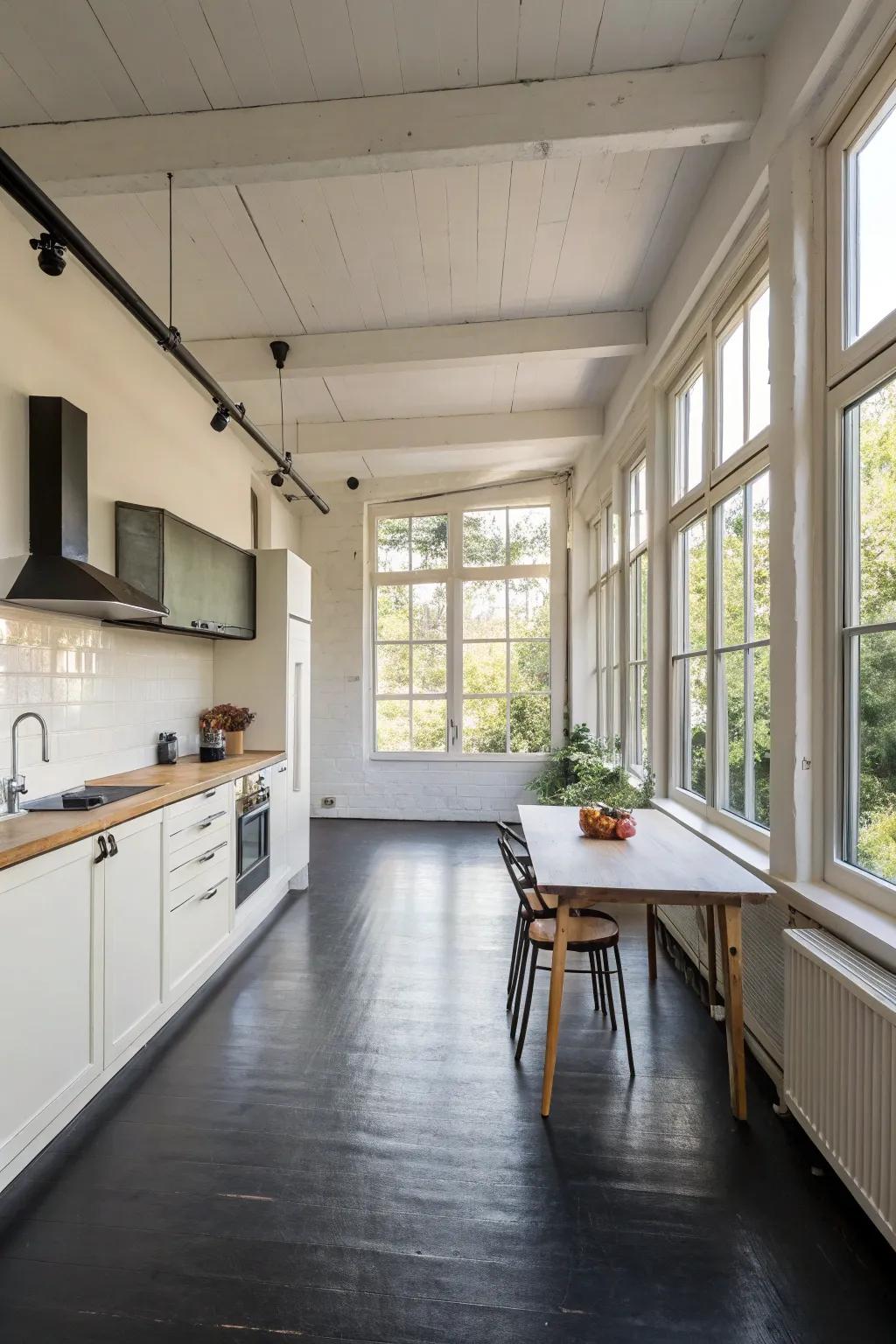 An open kitchen layout where dark flooring takes center stage.