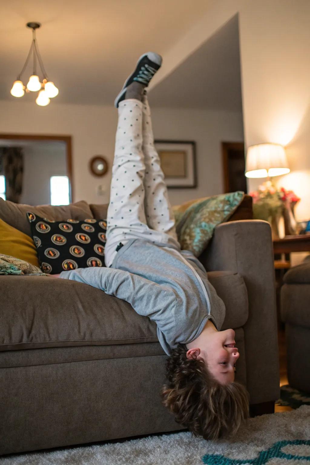 Upside down fun adds a whimsical twist to your couch pose.