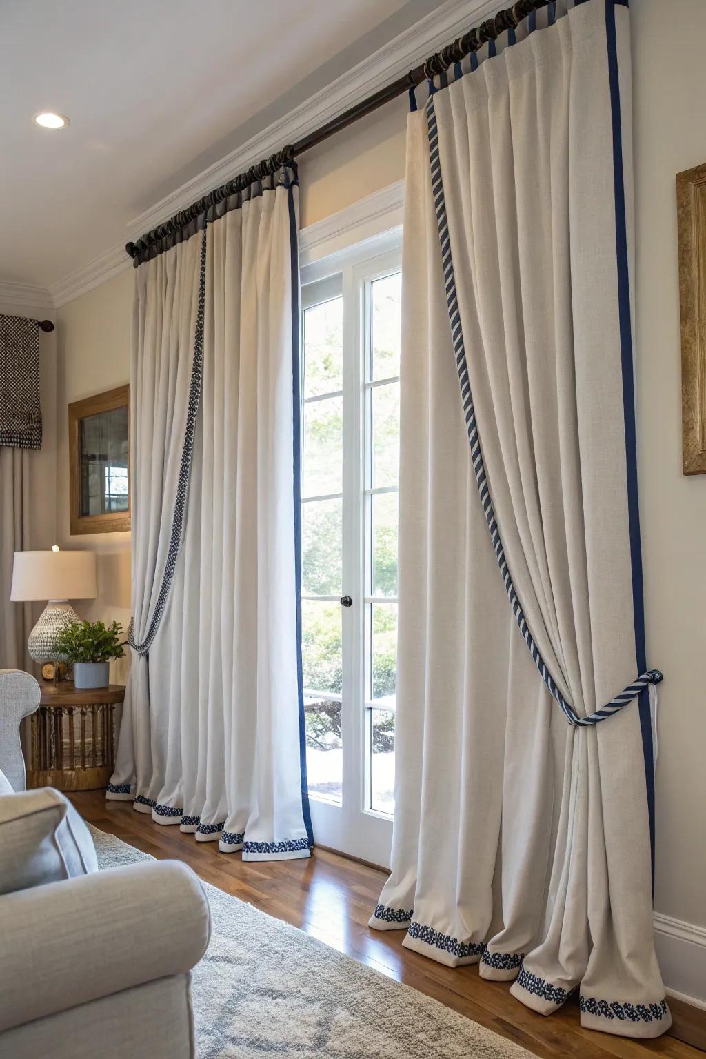 Crisp-looking drapes with contrasting corded embellishments.