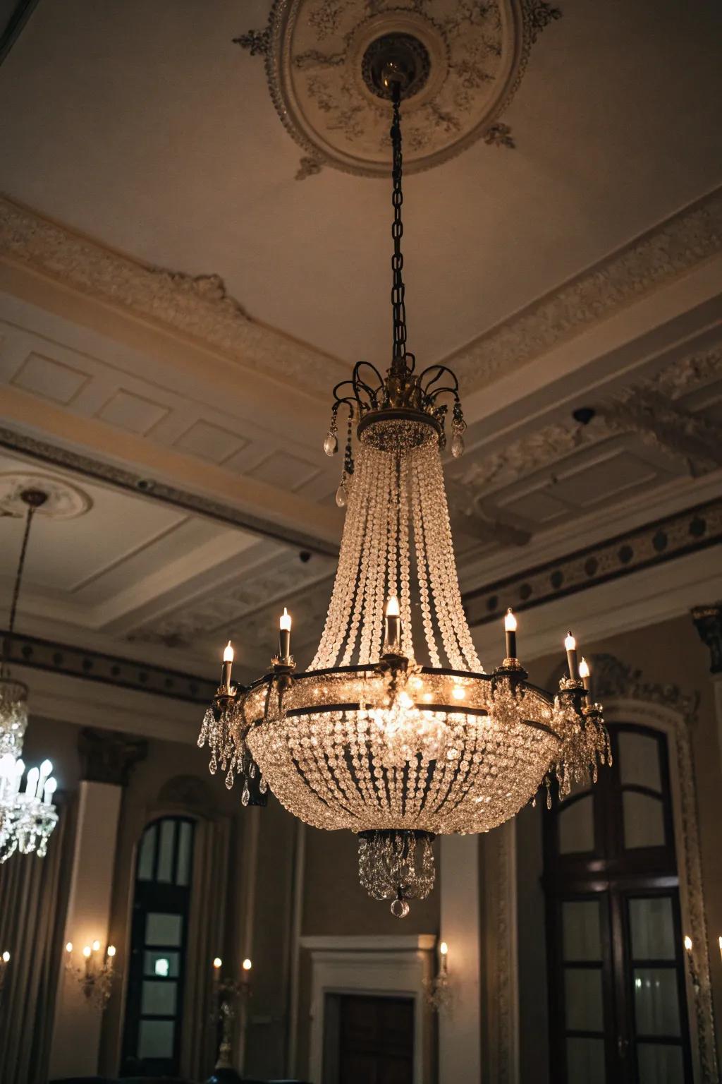 A chandelier illuminating the space with gothic appeal.