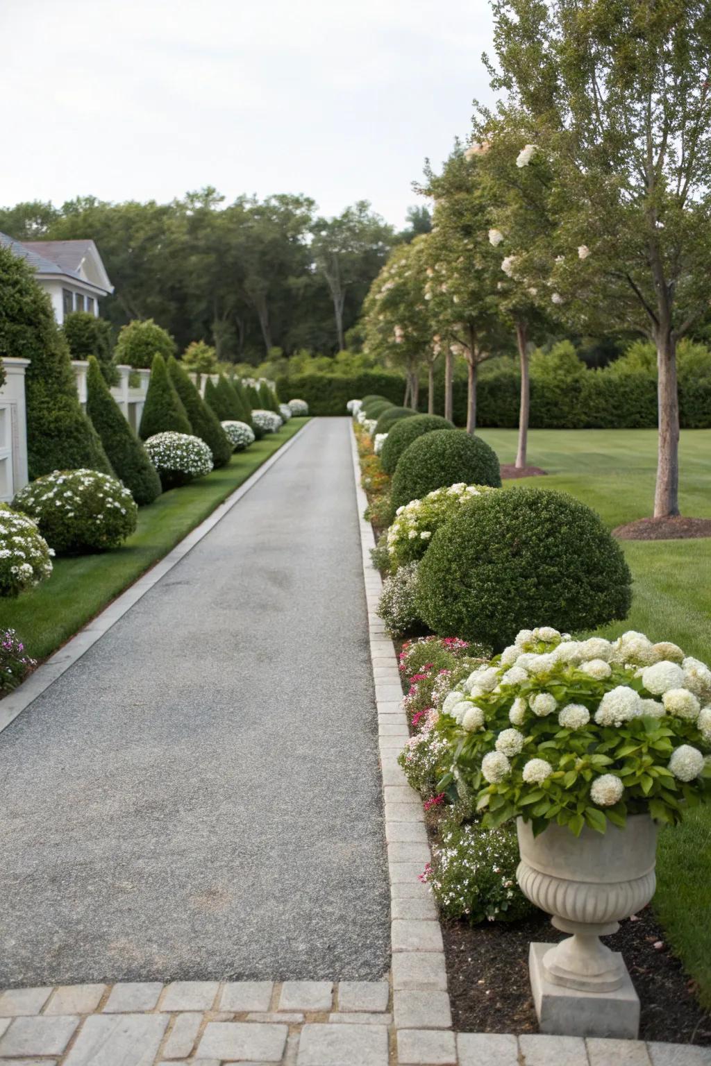 Balanced landscaping brings a sense of harmony to this driveway.