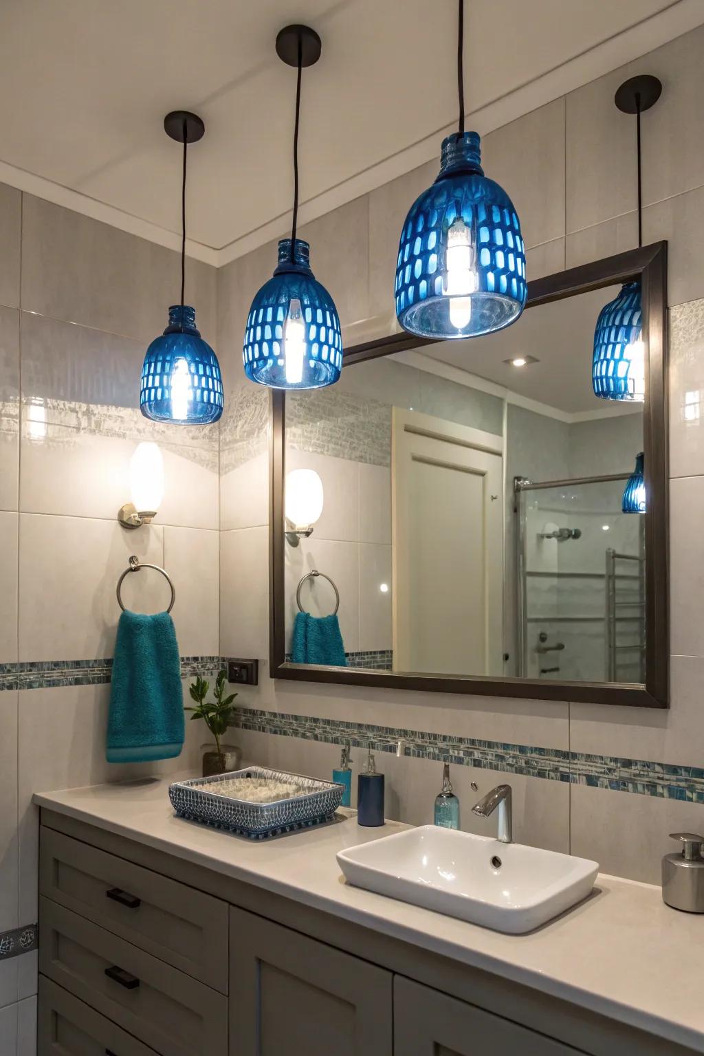 Azure suspended lamps brighten and introduce a touch of hue to this elegant washroom.