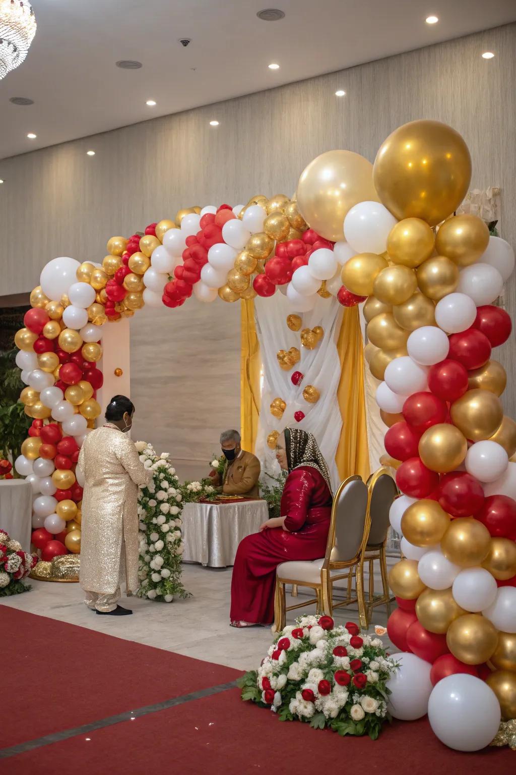 Festive balloon decorations adding a playful vibe to a rice-feeding ceremony.