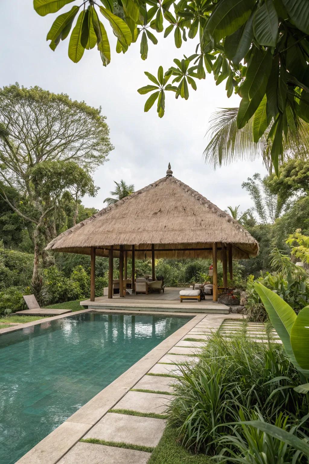 A thatched roof sanctuary crafts a tropical retreat in your backyard.