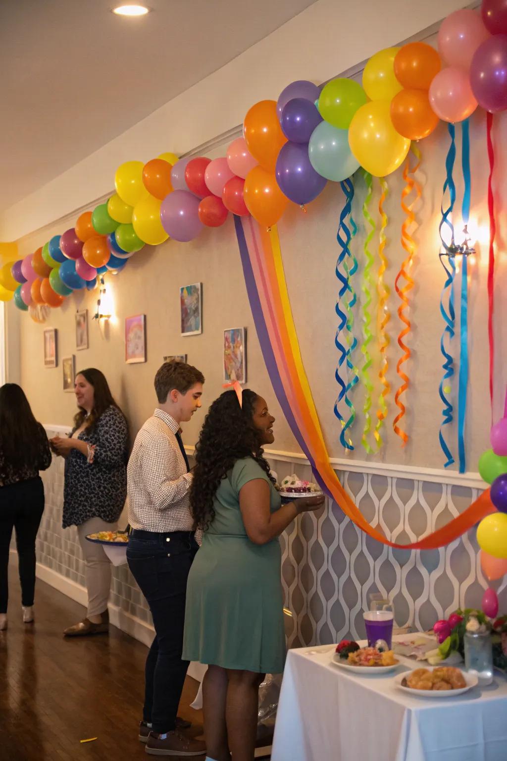 Balloon and ribbon wall decor, ideal for any celebratory event.