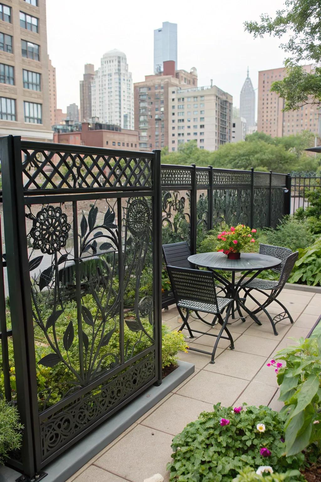 Themed designs on a metal fence infuse a distinctive element into this urban garden.