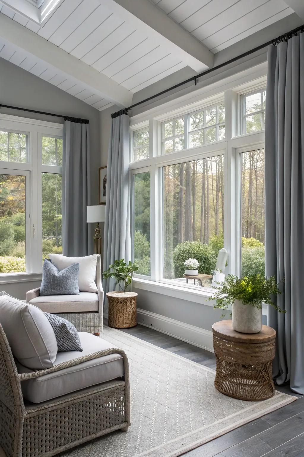 A sunroom with soft gray walls, embodying modern peace and elegance.