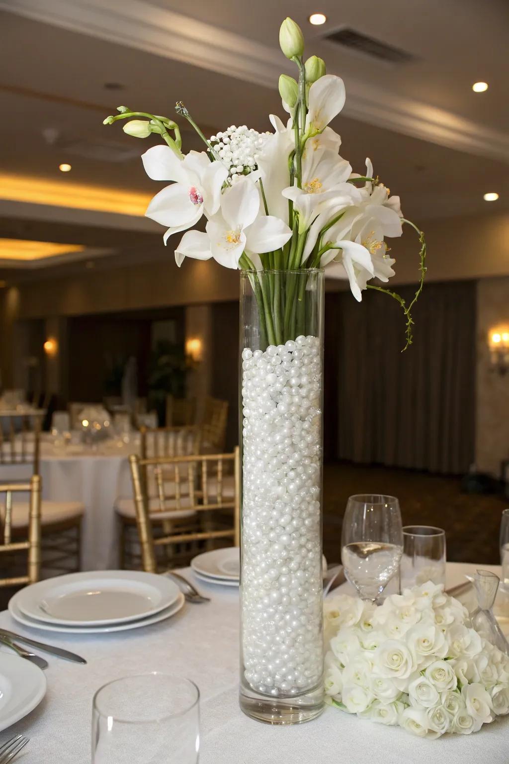 Ivory aqua gems and orchids serve perfectly at refined gatherings.