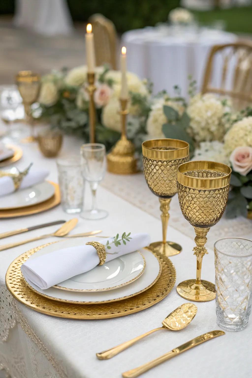 Gilded highlights introduce a lavish element to wedding table arrangements.