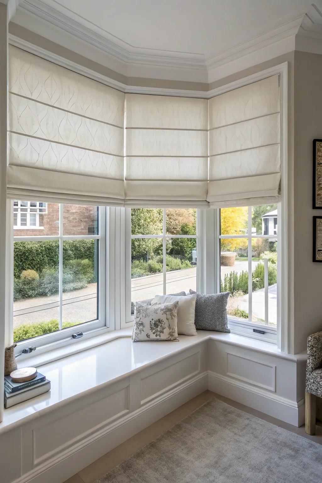 Roman shades furnish a neat and modern visual for bay windows.