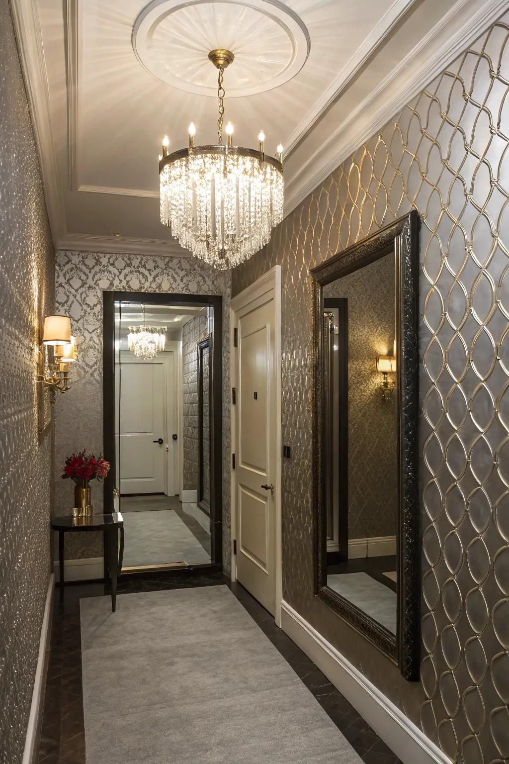 A luxurious entryway showcases metallic wallpaper, exuding a glamorous aesthetic.