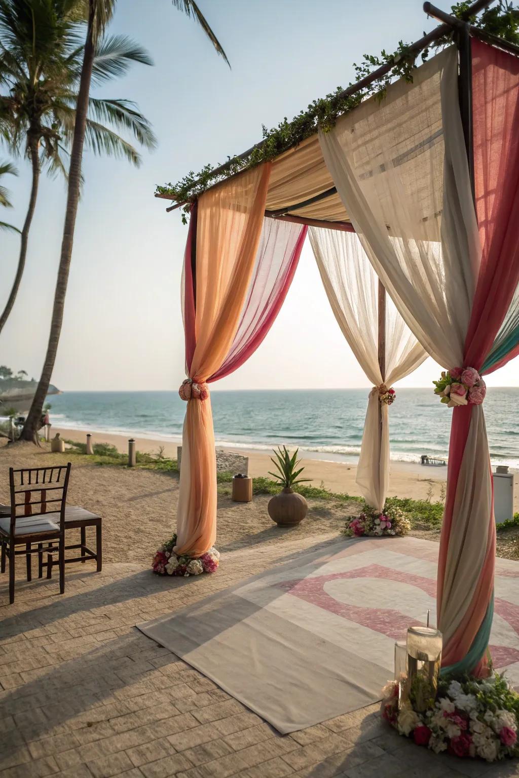 A seaside altar with flowing textiles creates a serene coastal vibe.
