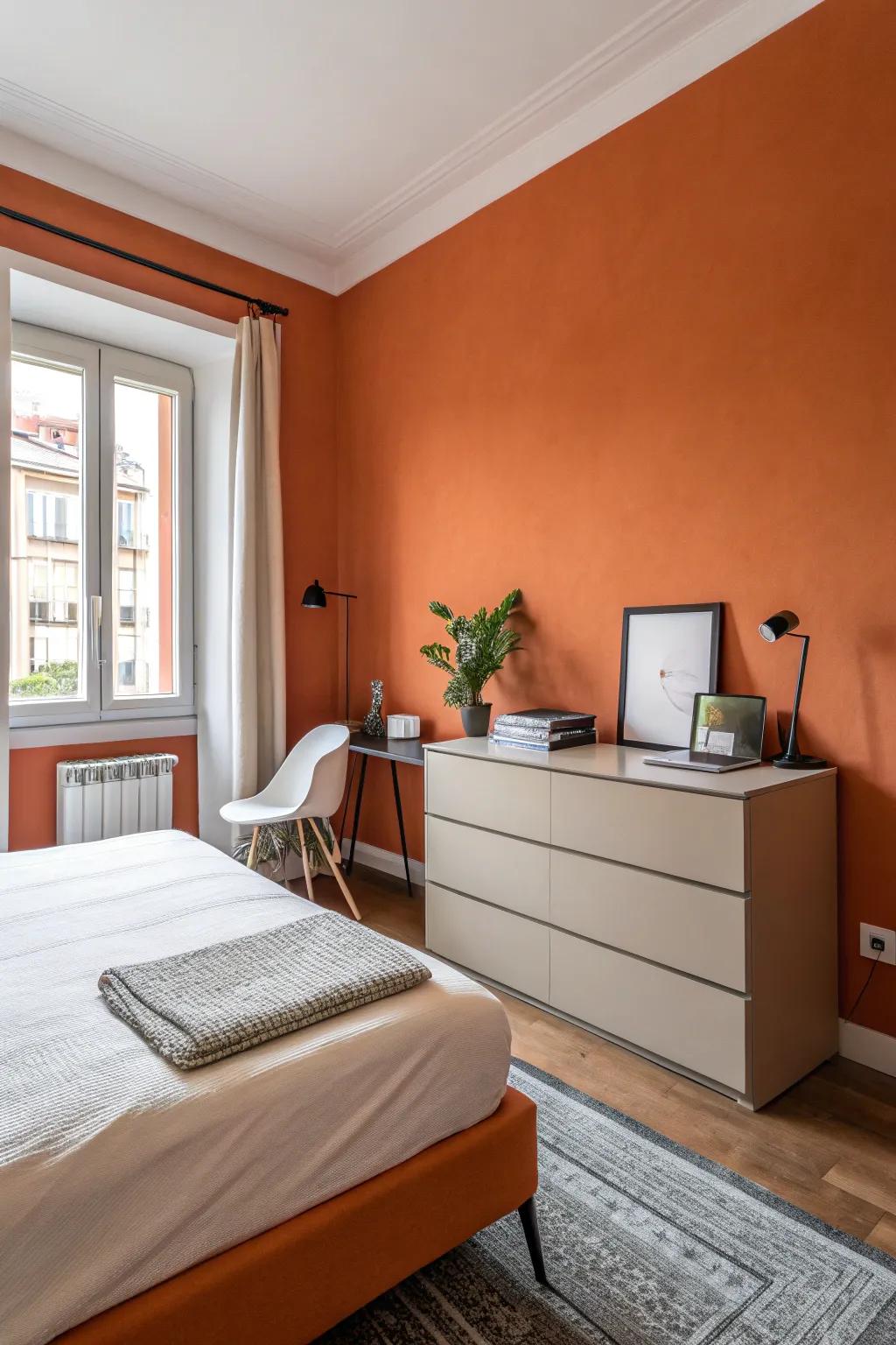 Uncluttered furnishings complement the effect of orange walls.