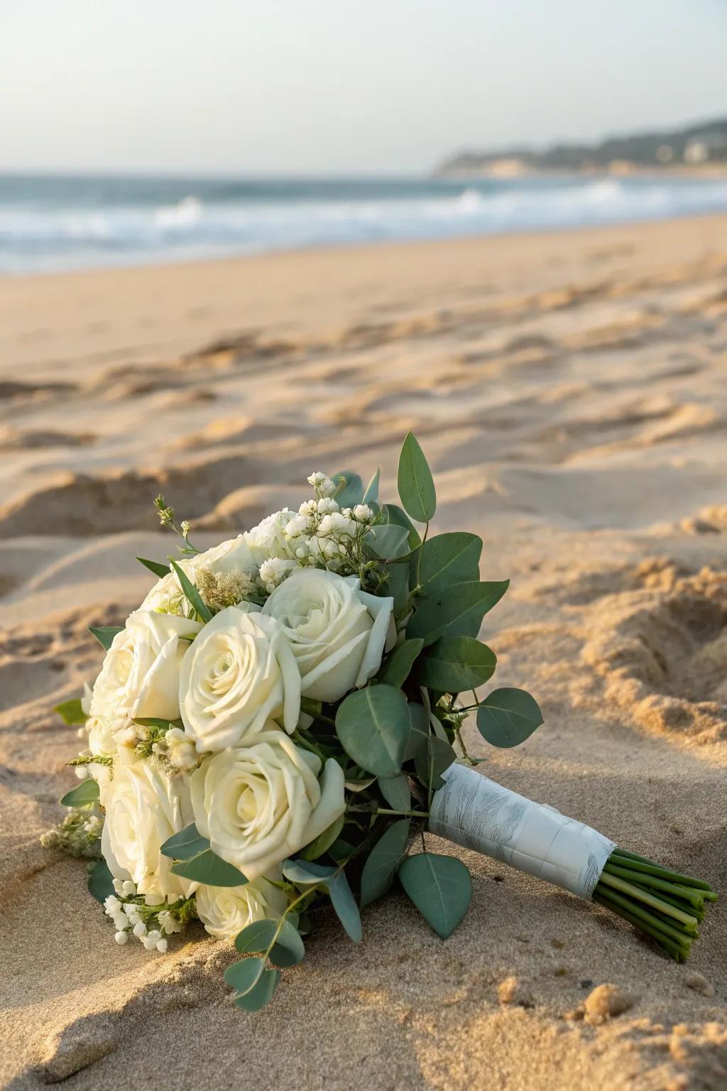 Whispers of white, a minimalist bouquet that speaks volumes on the beach.
