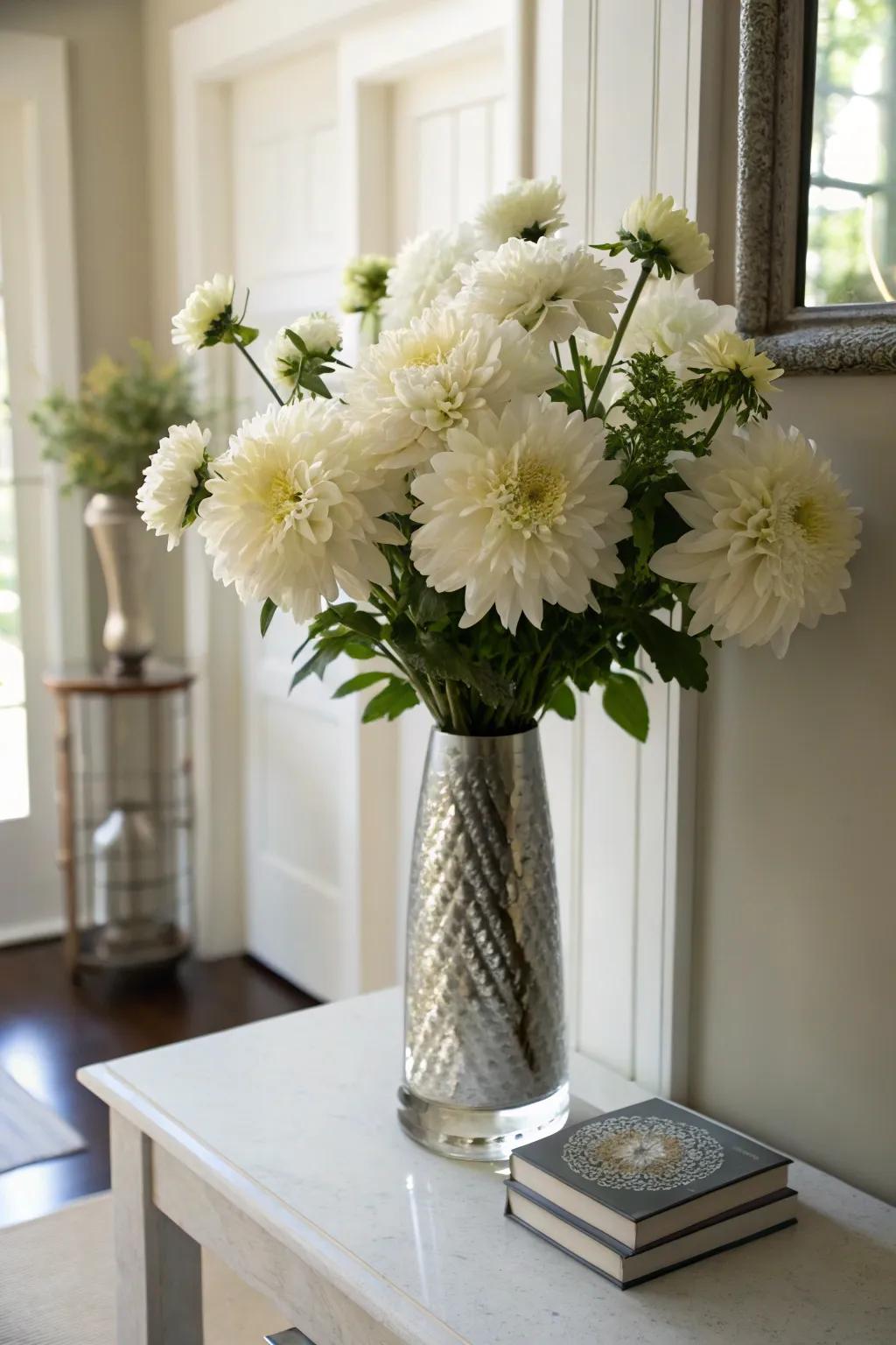 Elegant ivory dahlias making a declaration inside the entryway.