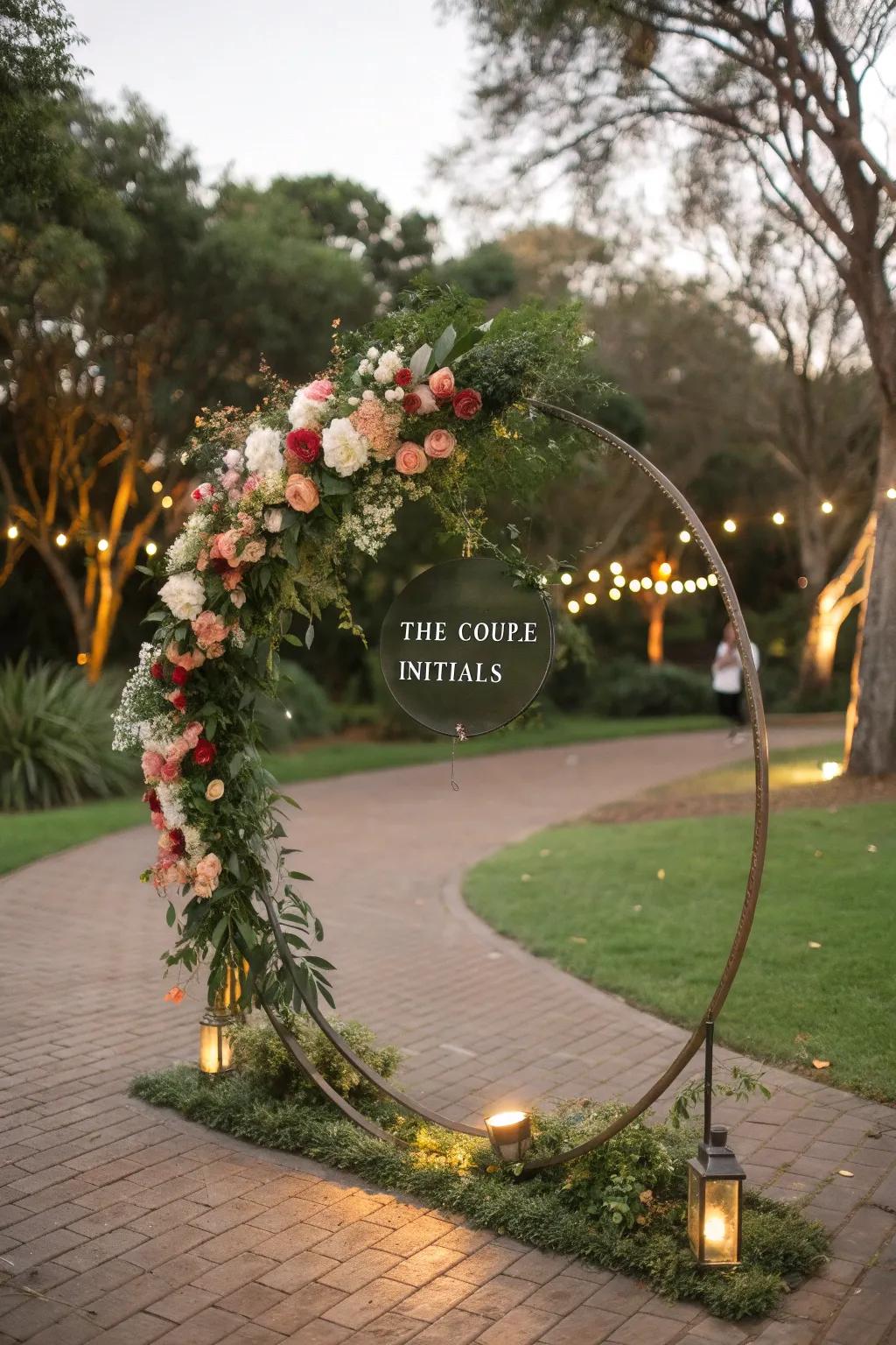 An individualized circular wedding arch featuring couple's initials.