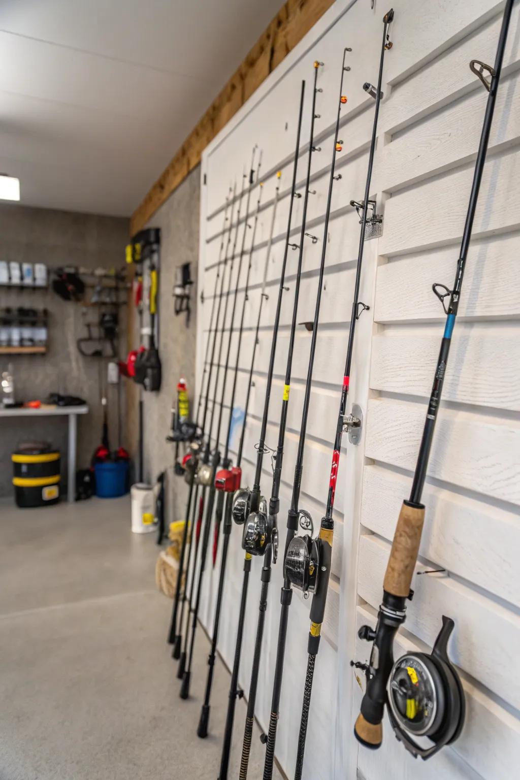 Fishing poles are securely and neatly stored on a slatwall.